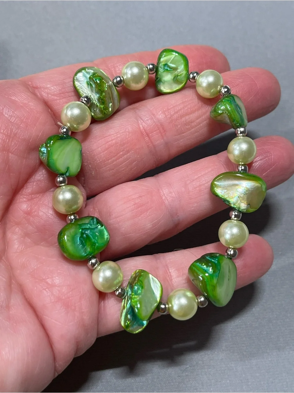NWOT lovely green bead & pearl looking bead bracelet.  Comfortably fits 7” wrist